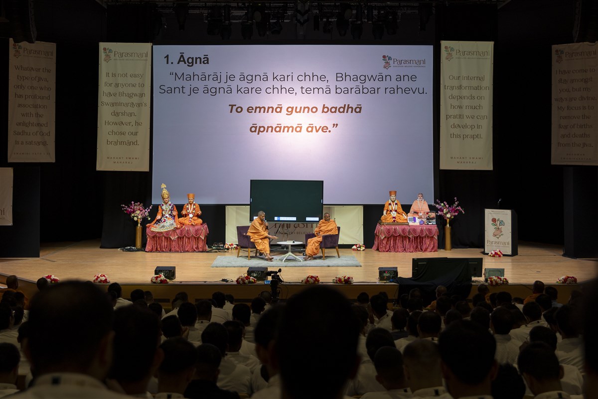 Atmatruptdas Swami and Dharmasetudas Swami guided delegates on agna as the first point of their classroom-style session