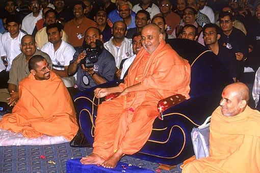 Swamishri is entertained by a stage presentation