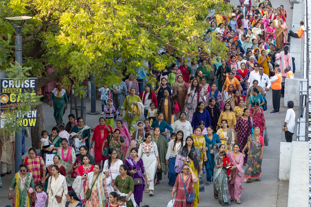 Devotees on their way to the celebration assembly