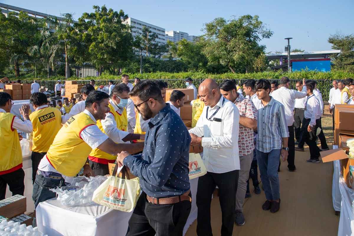 Devotees receive food packets