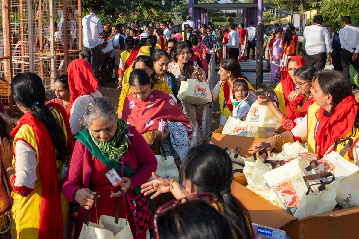 Devotees receive food packets