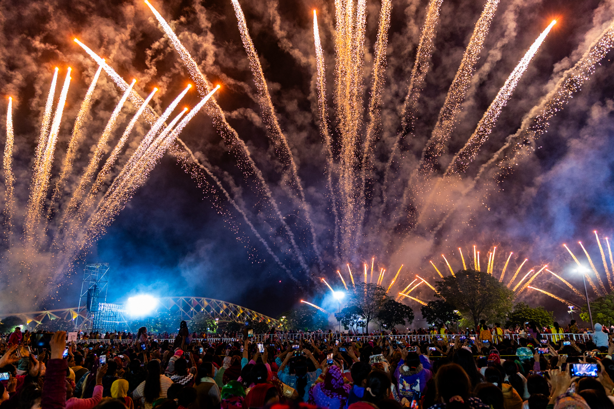 Devotees watch the fireworks