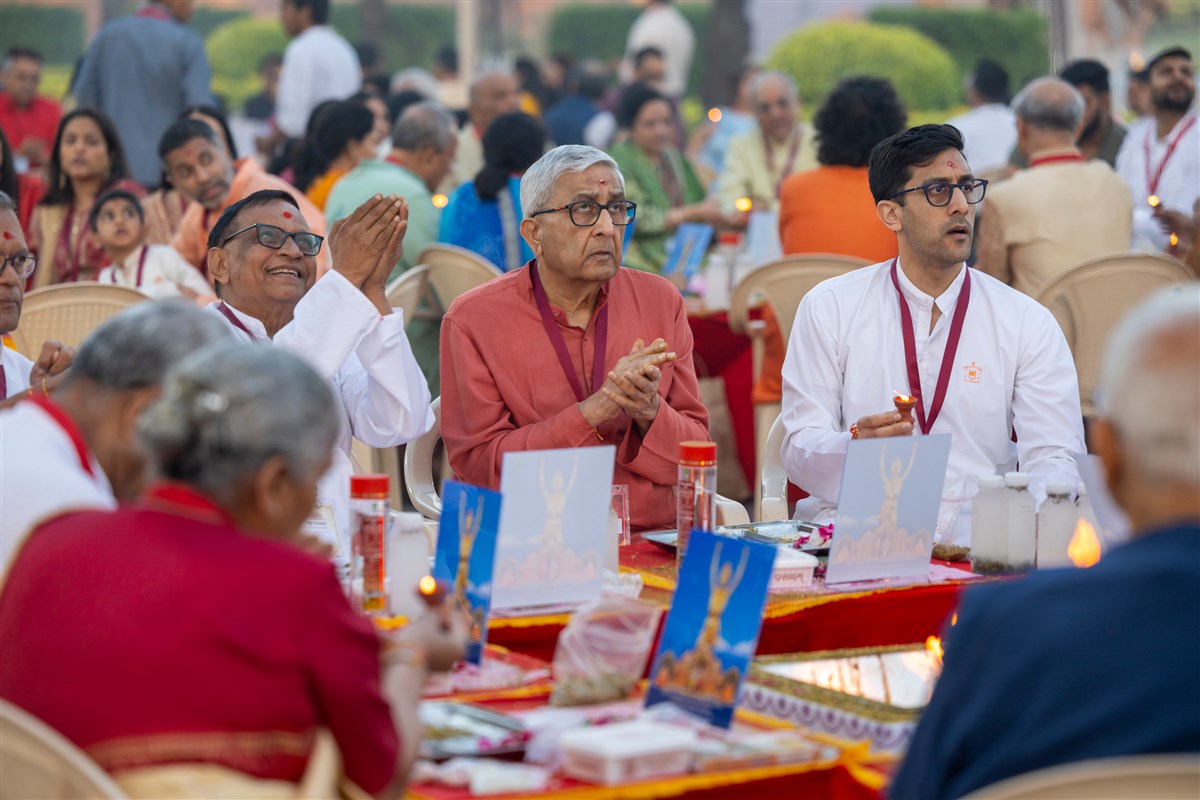 Devotees perform the arti