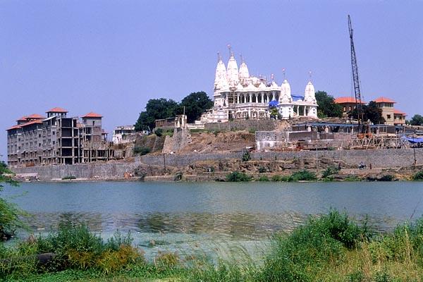 mandir and construction area with the river Ghela in the foreground