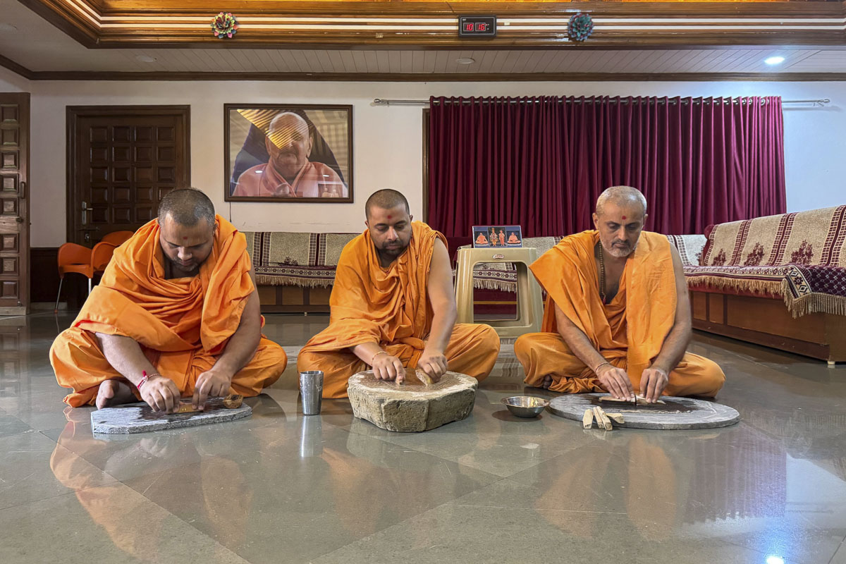 Sadhus Preparing Chandan for Children