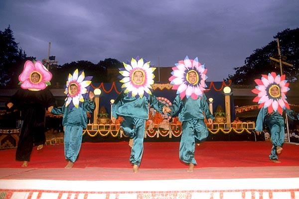Balaks perform a flower dance during the public assembly