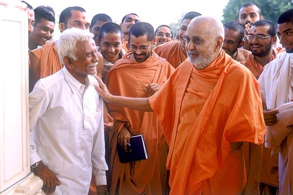 Caring moments with an aged dedicated devotee