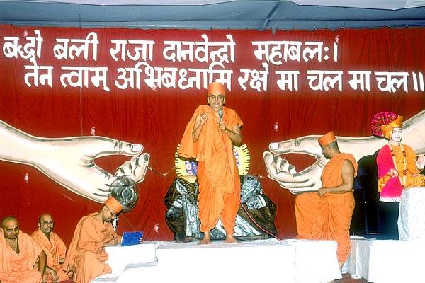 Swamishri blesses on Rakshabandhan day 	