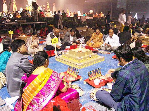 Participants of the World Peace Yagna perform rituals around the sacrificial fire