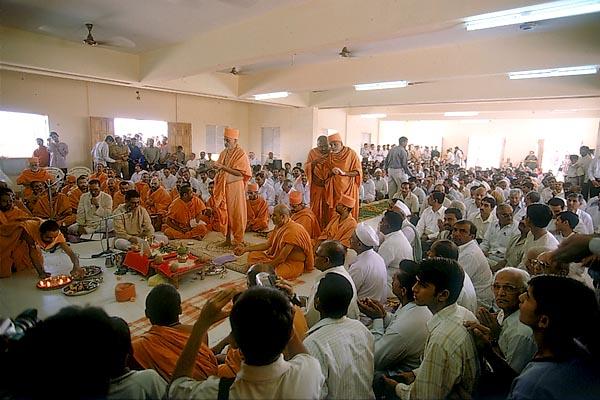 Devotees seated in the mandir hall during the pratishtha ceremony 