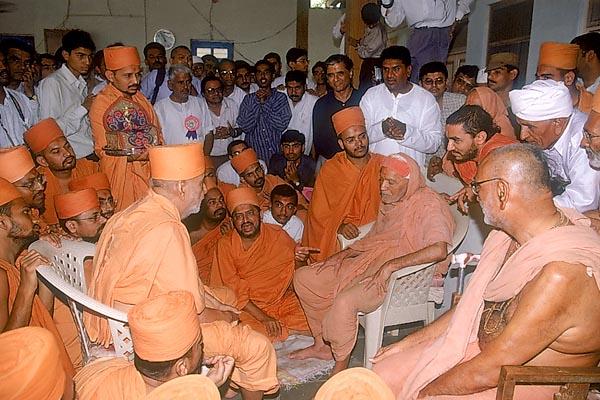  Swamishri meets and pays respects to the resident sadhus at the Gurukul 