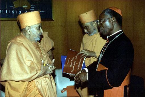 Swamishri with His Eminence Francis Cardinal Arinze, President of the Pontifical Council on Inter-religious Dialogue of the Vatican