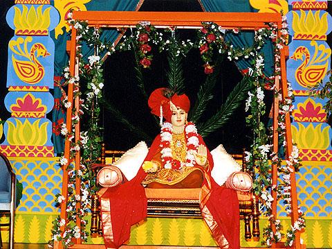 Lord Swaminarayan graced a beautifully decorated hindola [swing] at the Beal Auditorium