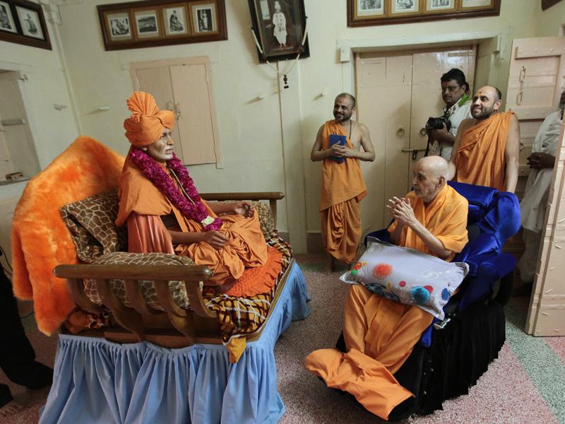  Swamishri engaged in darshan of Shastriji Maharaj