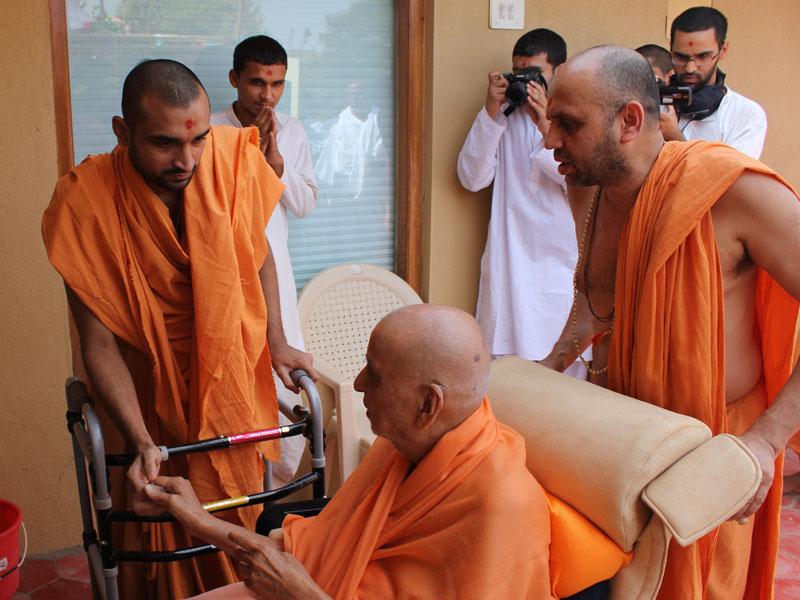 Swamishri blesses an ailing sadhu