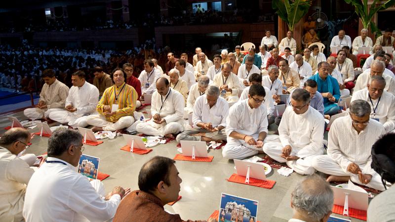  Devotees participate in pratishtha mahapuja rituals