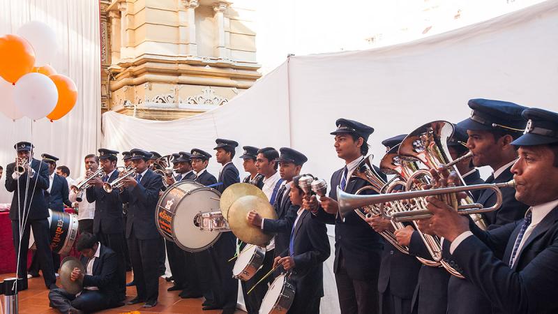  BAPS youths from Nadiad play a band