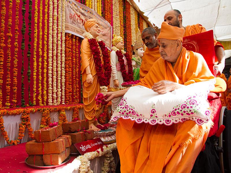  Swamishri sanctifies bricks to start construction of new BAPS Mandir at Jindva (Dahegam), India
