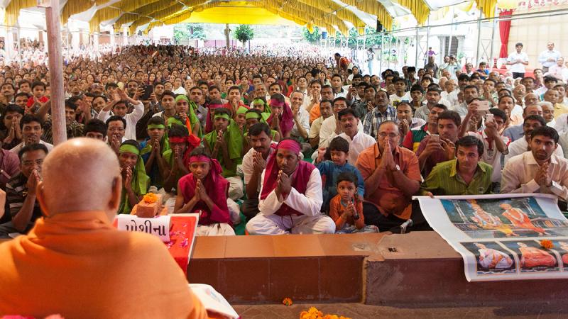  Swamishri blesses tribal devotees from Poshina