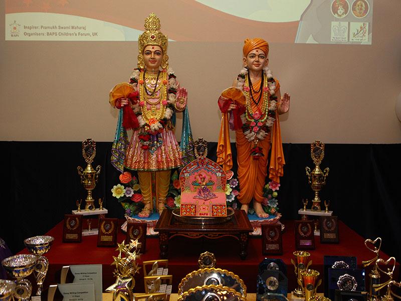 KUC prizes for 
girls from Upcountry UK, sanctified by being offered to Shri Akshar Purushottam Maharaj