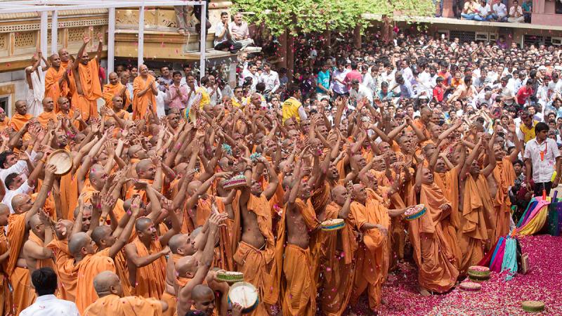  Sadhus enjoy the celebrations with flower petals and rejoice in the presence of Swamishri