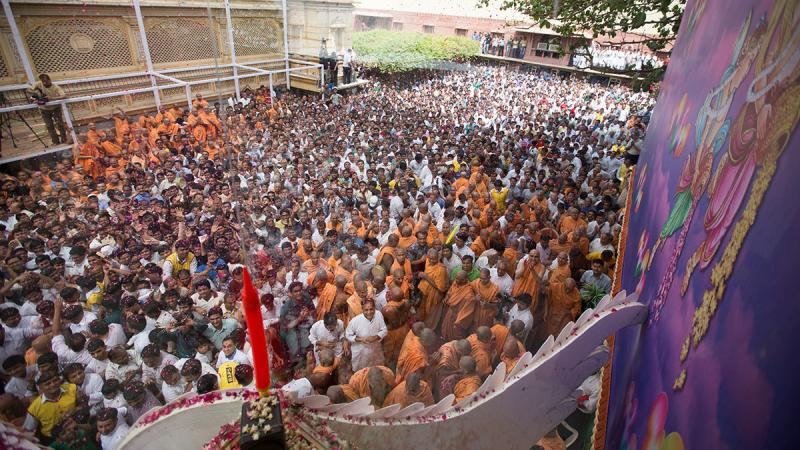  Sadhus and devotees rejoice during the Pushpadolotsav festival
