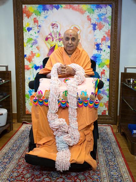  Swamishri is honored with garlands