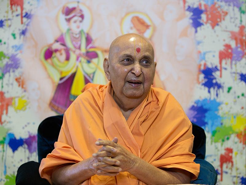  Swamishri in a divine, festive and jovial mood