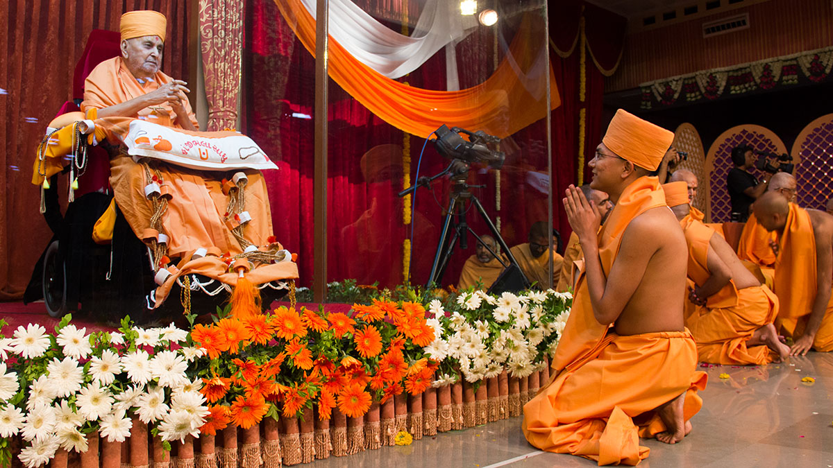 Swamishri blesses the newly initiated sadhus
