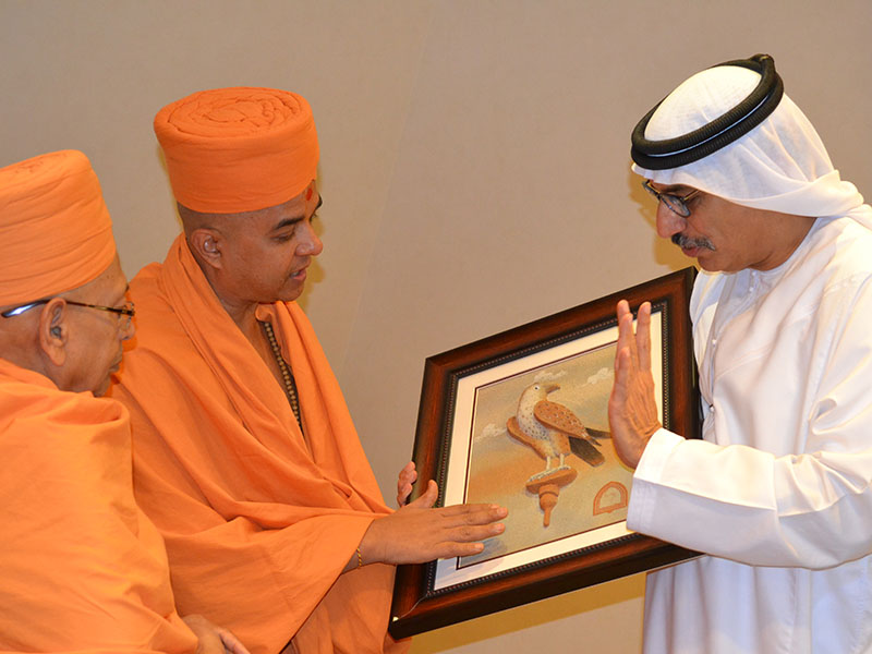 Sadhus meeting the vice-chancellor of the Higher College of Technology, Dr. Tayeb A. Kamali, Abu Dhabi