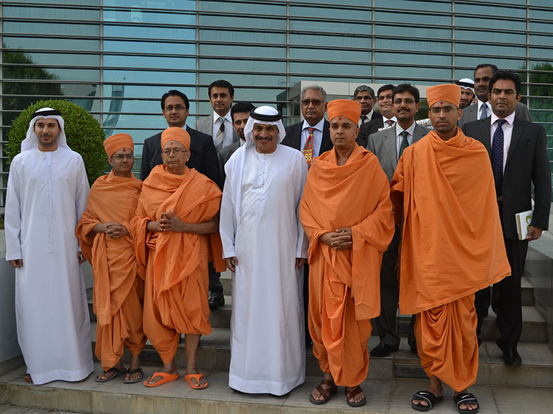 Sadhus meeting the vice-chancellor of the Higher College of Technology, Dr. Tayeb A. Kamali, Abu Dhabi