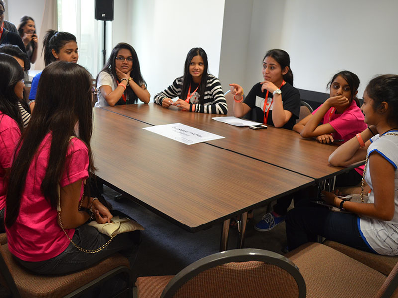 Kishoris participating in group activities