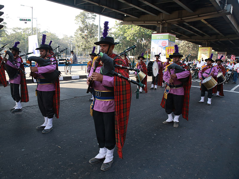 Nagar Yatra - a colorful and joyous musical procession of the murtis through the streets of Kolkata