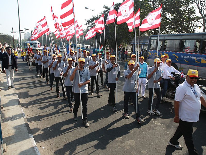 Nagar Yatra - yuvaks participate in the procession with BAPS flags