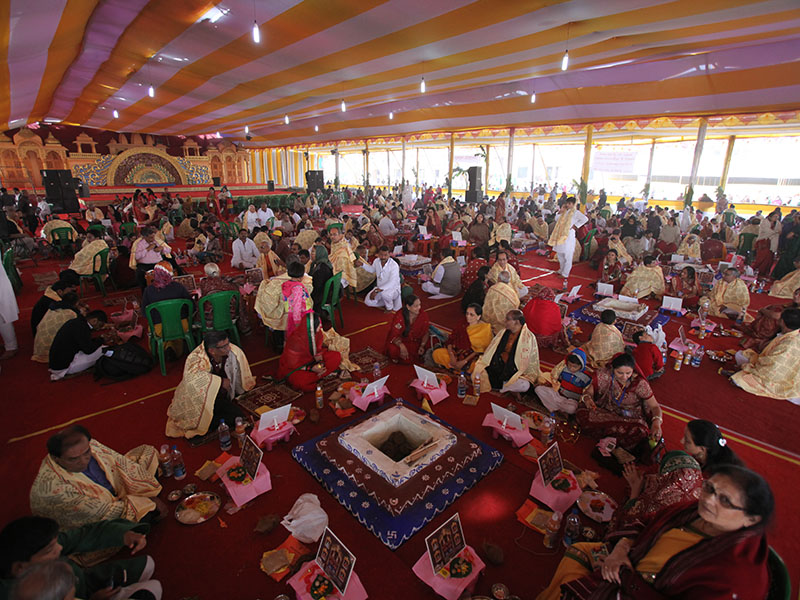 Vishwa Shanti Mahayaag - families perform yagna rituals