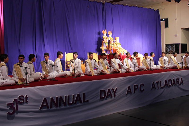 Youths sing kirtans as part of the Annual Day celebrations