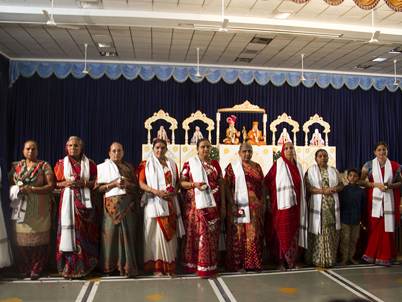 Senior women devotees are felicitated