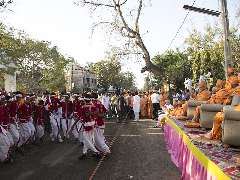 Senior sadhus observe and bless the procession