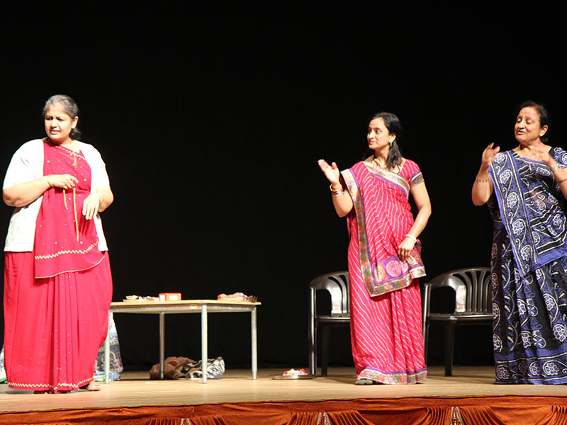 A cultural performance by yuvatis and mahilas