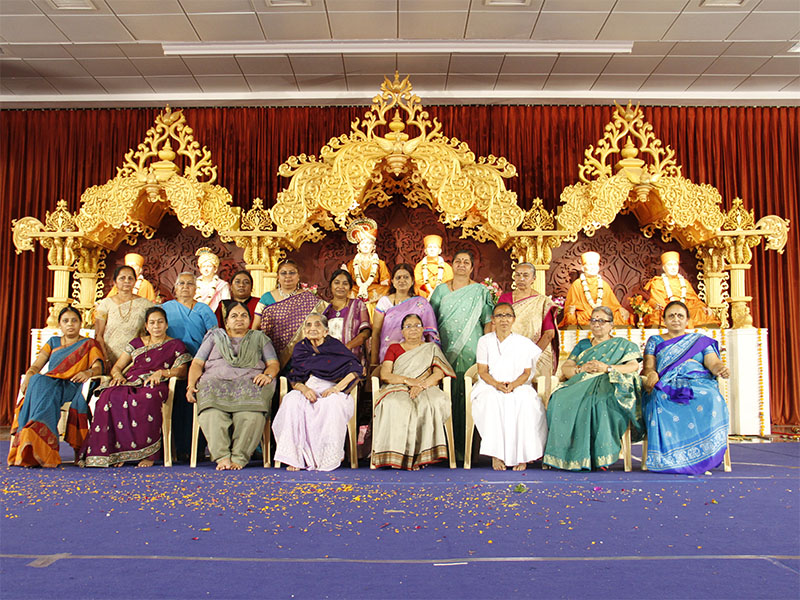 Senior women devotees are felicitated