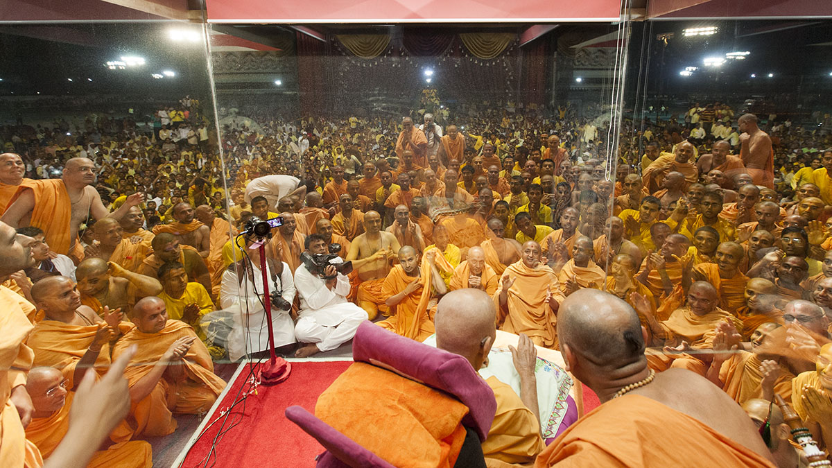Sadhus and devotees gather for darshan of Swamishri