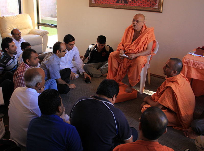 Pujya Ishwarcharan Swami and sadhus during a padhramni
