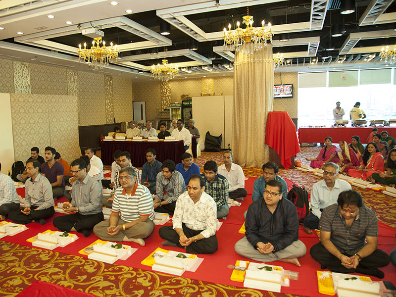 Devotees participate in mahapuja