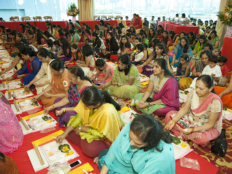 Devotees participate in mahapuja