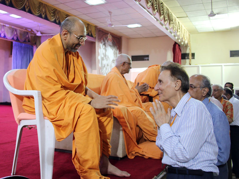 Pujya Doctor Swami and sadhus personally meet and bless Doctors after the Conference