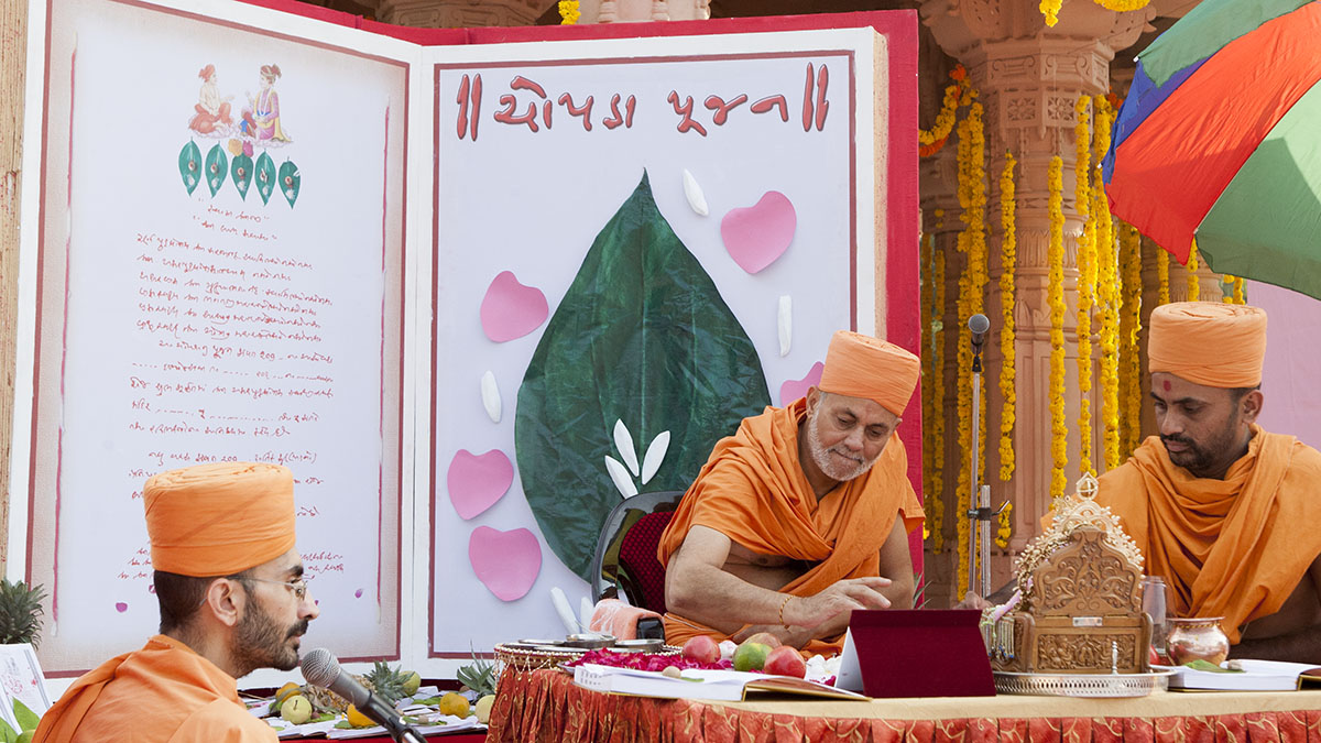 Mahapuja rituals being performed during Chopda Pujan
