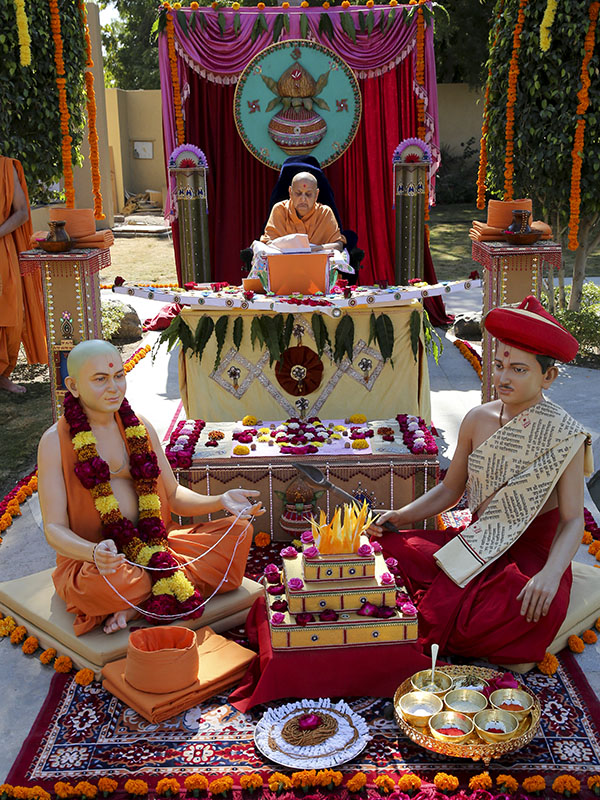 HH Pramukh Swami Maharaj performs his morning puja in front of tableau depicting the bhagwati diksha of Aksharbrahman Gunatitanand Swami, on the auspicious day of Poshi Punam