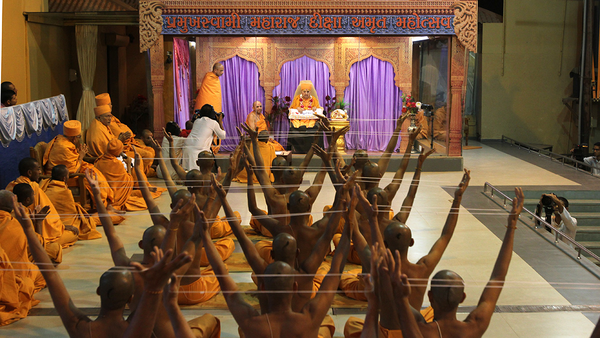 Newly initiated sadhus participate in diksha ceremony