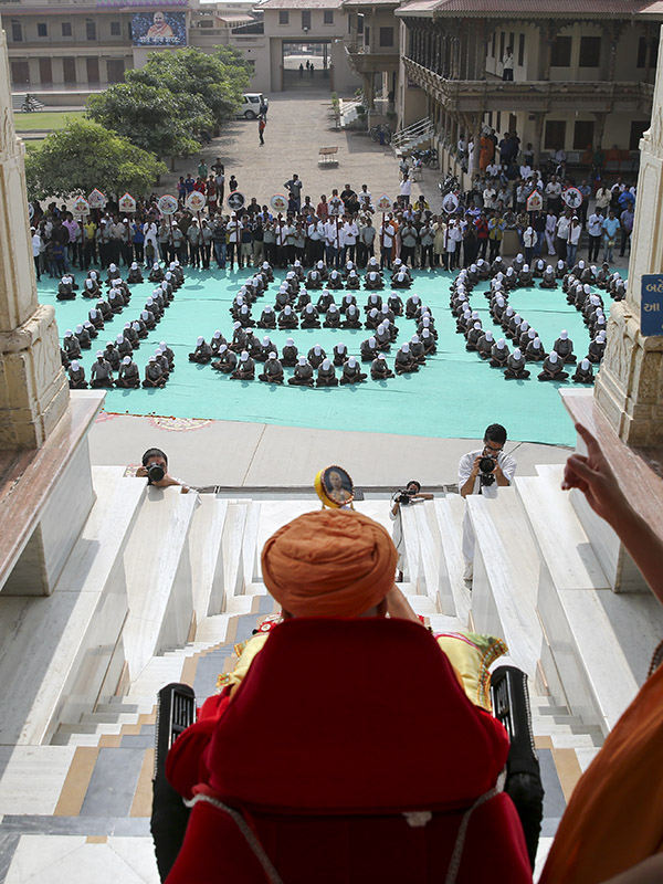Students create 150 to mark the 150th birth anniversary of Brahmaswarup Shastriji Maharaj
