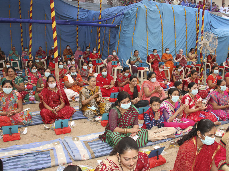 Devotees participate in mahapuja rituals